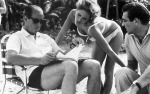 Terrance Young reads to Ursula Andress and Sean Connery